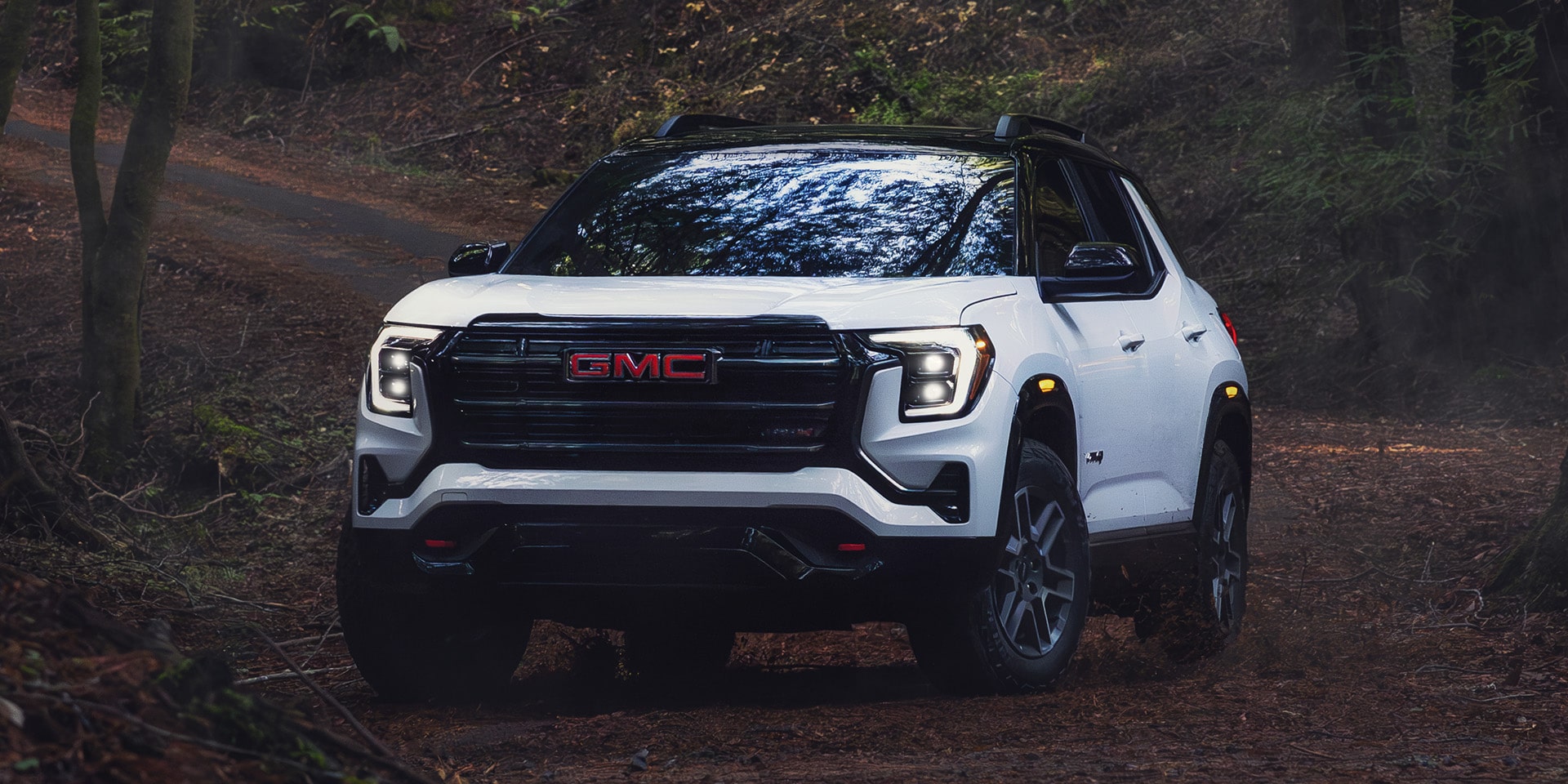 Front Three-Quarters View of the 2026 GMC Terrain AT4 Small Off-Road SUV.