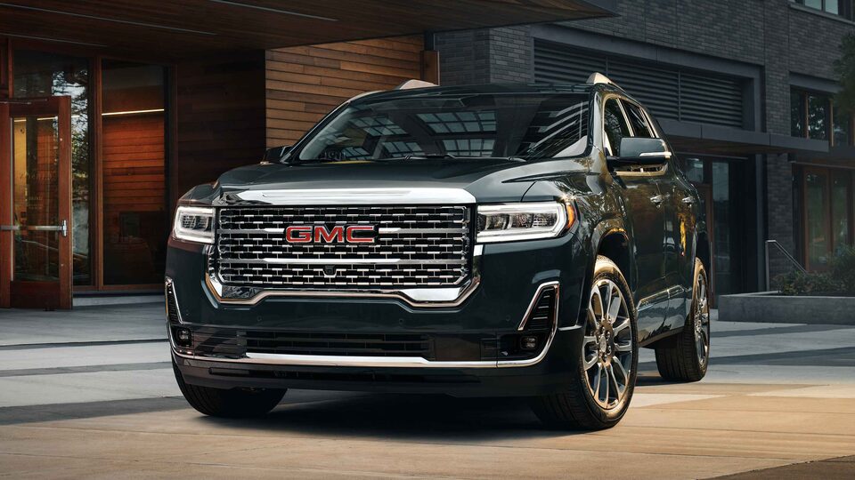 2022 Acadia Denali parked outside.