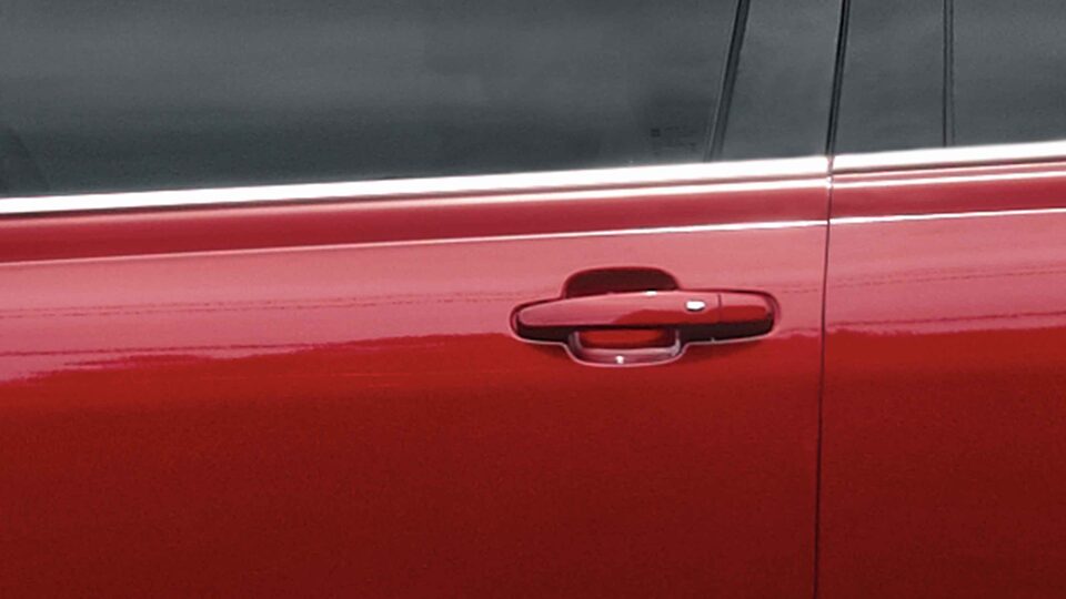 2022 GMC Acadia parked outside a home.