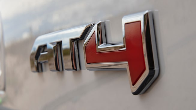 2023 GMC Yukon AT4 badge.
