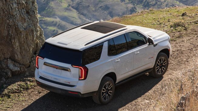 2022 GMC Yukon AT4 rear angle view.