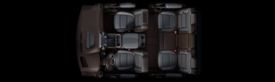 Bird's-eye view of the 2023 Sierra HD interior dark walnut/dark ash grey seats.