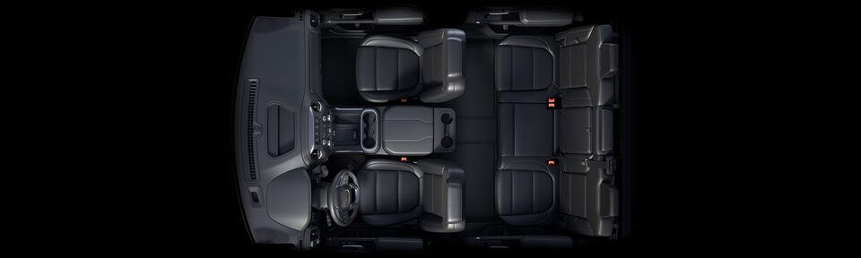 Bird's-eye view of the 2023 Sierra HD interior jet black seats.