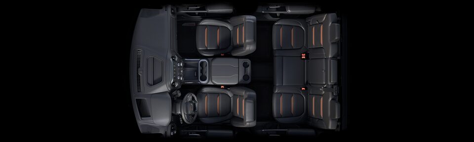 Bird's-eye view of the 2023 Sierra HD interior jet black with kalahari accents seats.