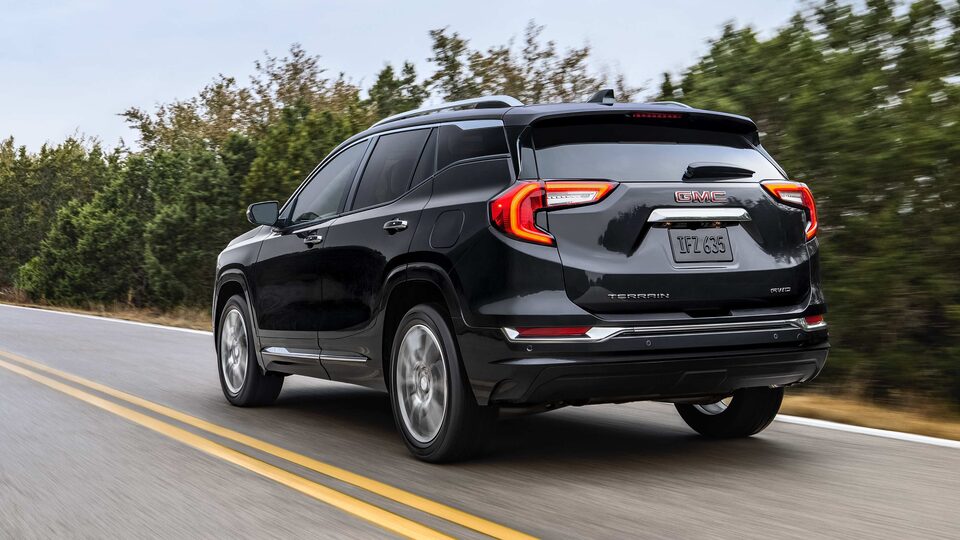 2023 GMC Terrain smoothly driving on the road.