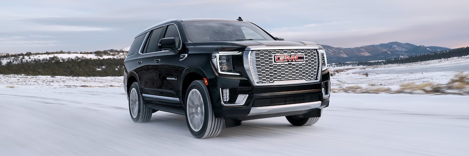 2024 GMC Yukon Denali parked on a snowy environment.