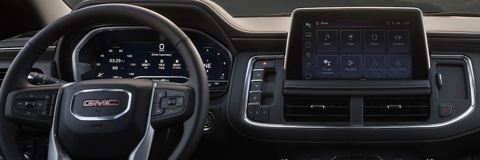 Technological interiors of the 2024 GMC Yukon SLE/ SLT.