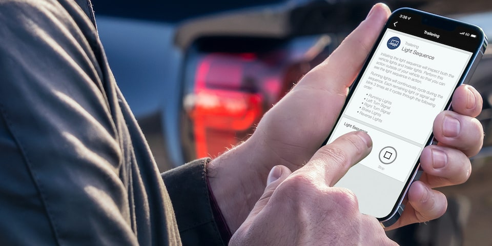 A person using his smartphone to access information.