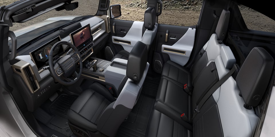 Vue aérienne des deux rangées de sièges et de l’habitacle horizon lunaire du GMC Hummer EV 2025.