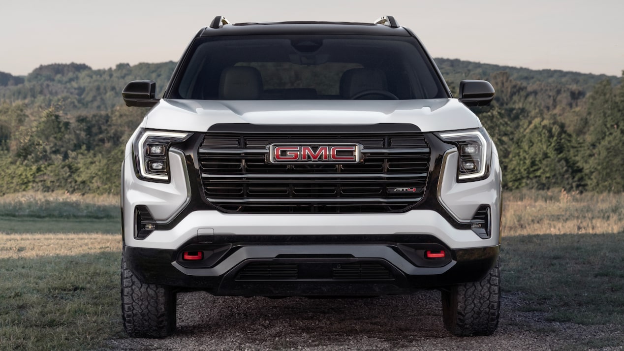 Front view of the 2025 GMC Terrain parked outdoors on a sunny day.