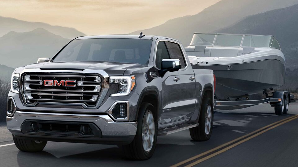 2022 GMC Sierra 1500 trailering a boat.