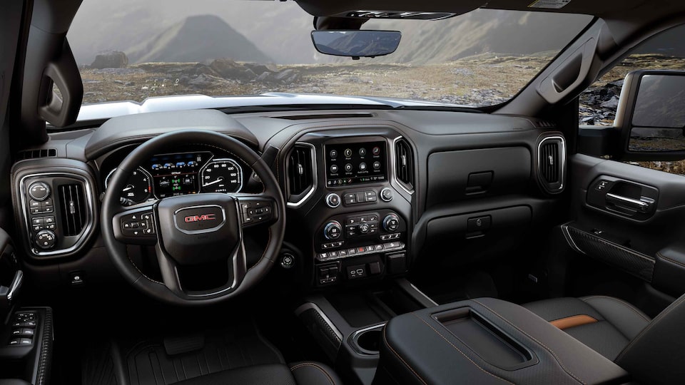 2022 Sierra HD AT4 athletic interior dashboard featuring the steering wheel.