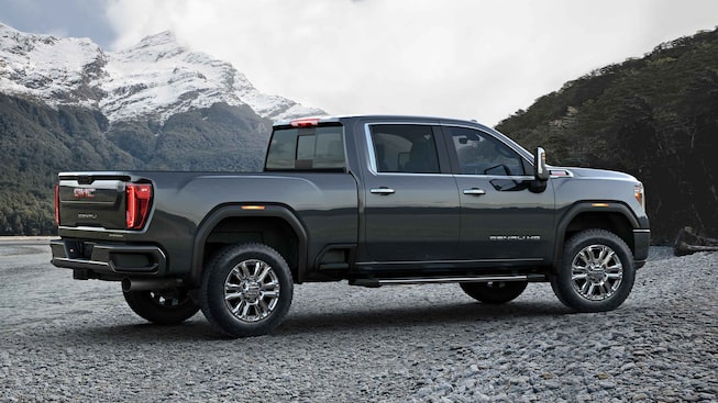 Right-side view of the 2022 Sierra HD Denali parked outdoors.
