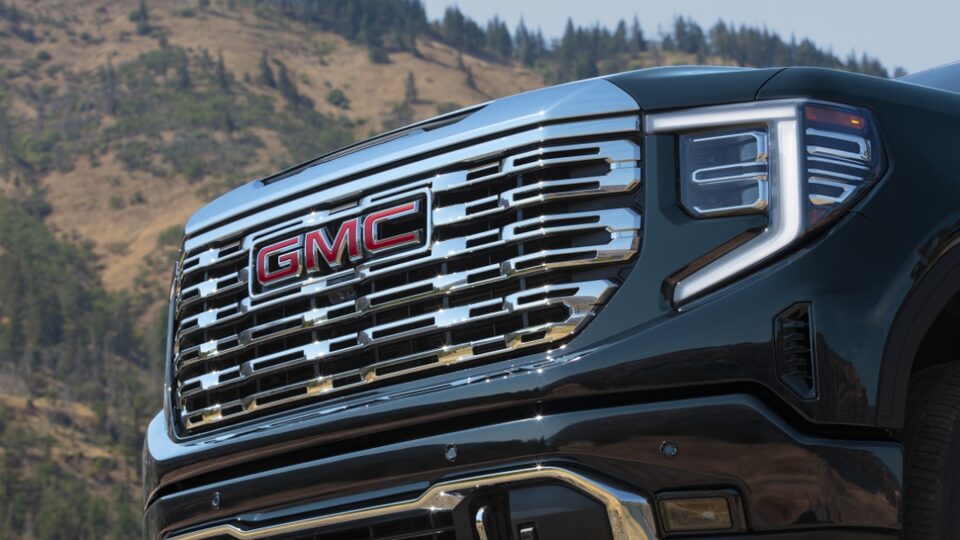Close-up of 2023 Sierra Denali front grille.