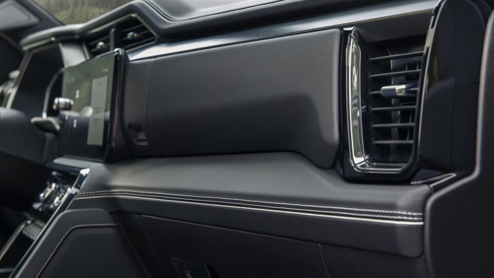 2022 Sierra 1500 AT4X: Red double-needle stitching and ceramic white accents.