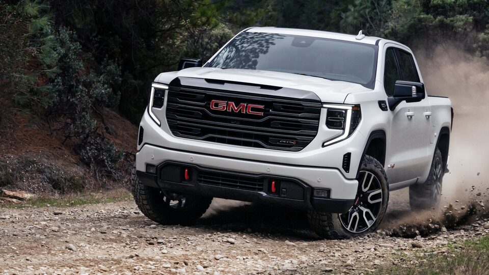 2022 GMC Sierra 1500 AT4 driving off-road.
