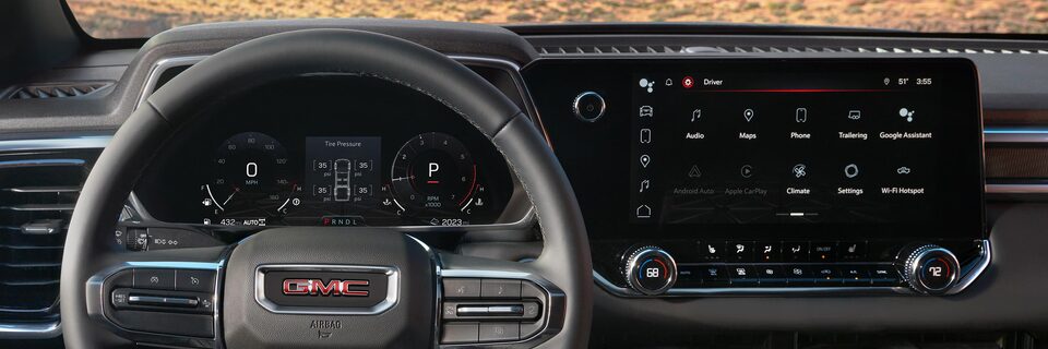Driver's view of the 2025 GMC Canyon Elevation Steering Wheel and Infotainment System.