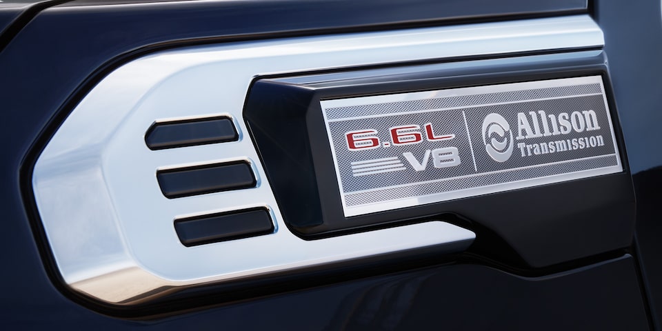 Close-up View of  "6.6 L V8" and "Allison Transmission" Badging on a 2025 GMC Sierra HD Pro/SLE/SLT Truck.