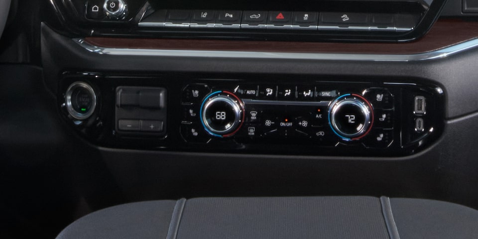 Close-up View of the Climate Controls in a 2025 GMC Sierra HD Pro/SLE/SLT Truck.