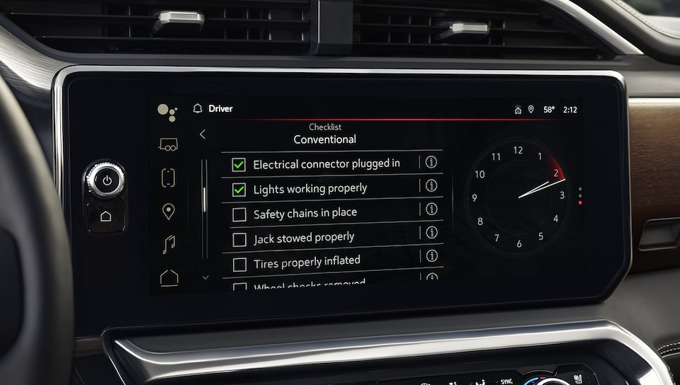 Close-up of the Infotainment System of the 2025 GMC Sierra 1500 Displaying the Available Prograde Trailering System.