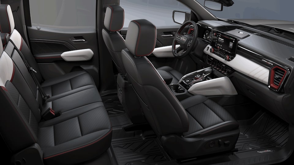 Intérieur avant du GMC Canyon AT4X 2023 en Obsidian Rush.