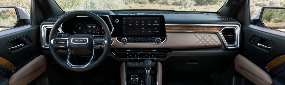 2023 Canyon Denali front interior featuring the dashboard.