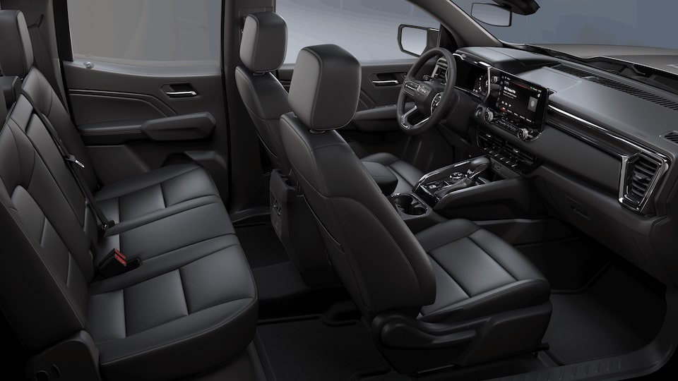 Side interior view of the 2022 GMC Canyon in Jet Black Leather-appointed front seats.
