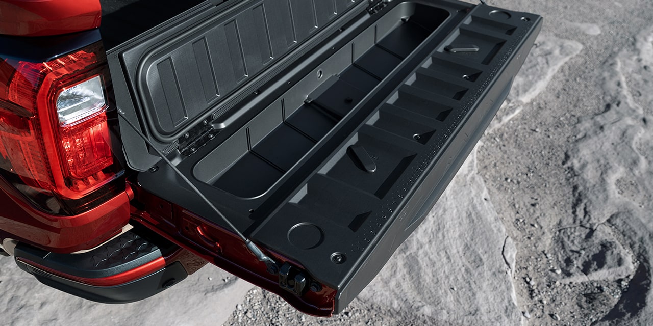 Close-up view of the MultiStow Tailgate of the 2026 GMC Canyon Elevation.