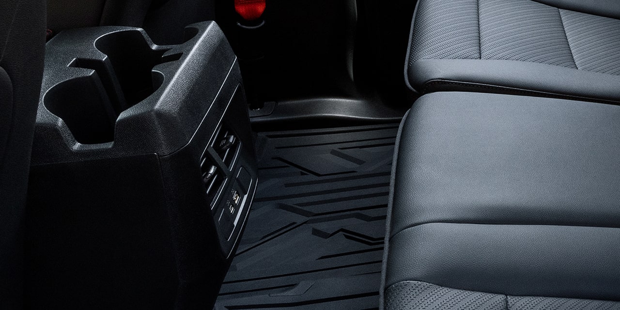 Close-up view of the AC vent behind the Rear Console of the 2026 GMC Canyon Elevation.