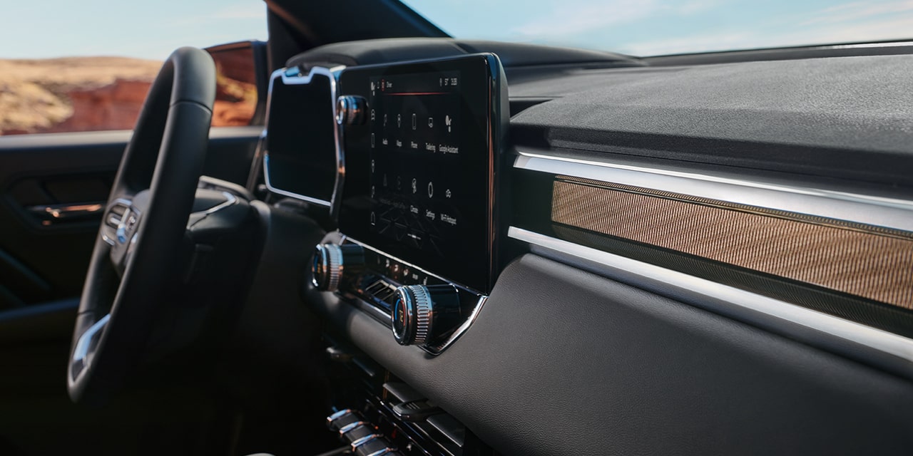Front passenger's view of the infotainment screen of the 2026 GMC Canyon Elevation.