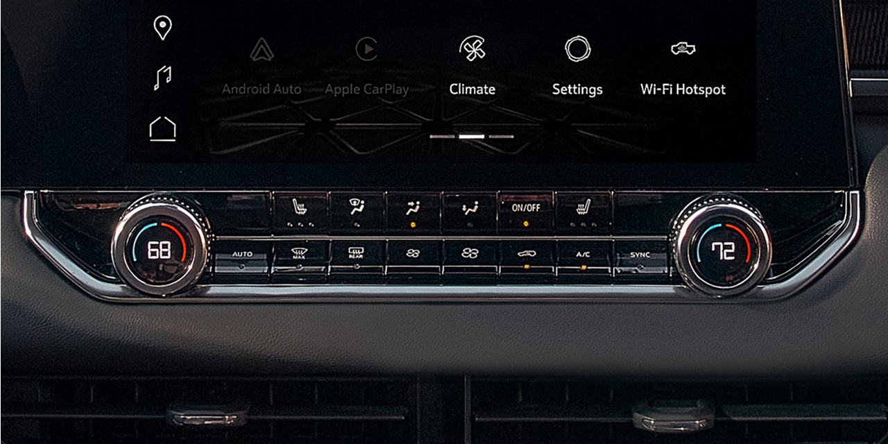 Close-up view of the Climate Control buttons inside the 2026 GMC Canyon Elevation.