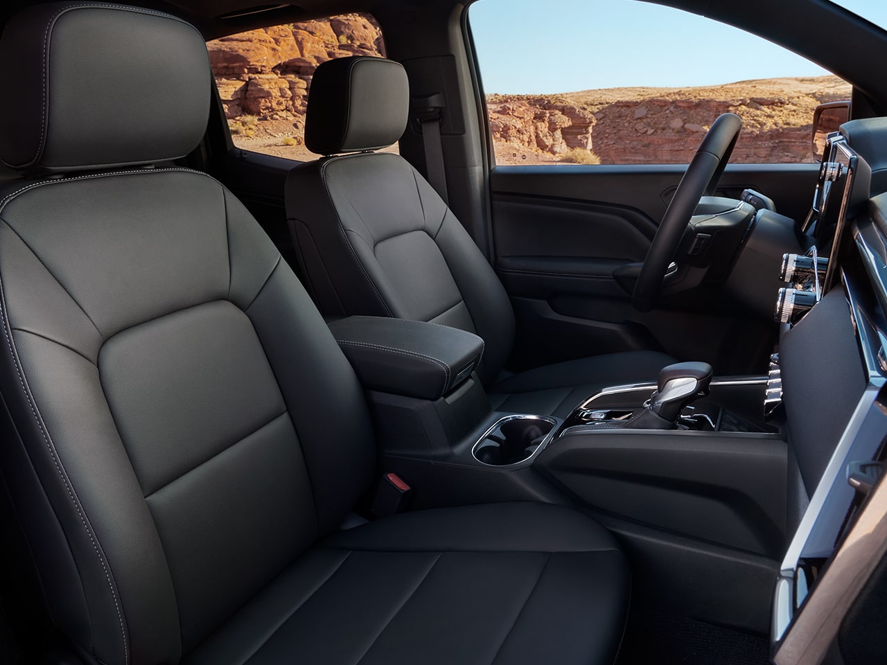 Side view of the Front Interiors of the 2026 GMC Canyon Elevation.