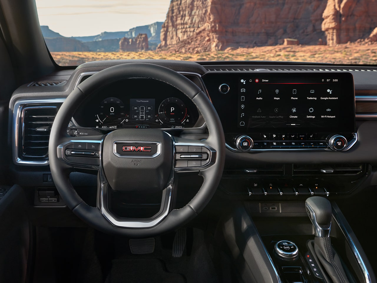 Driver's view of the front interiors of the 2026 GMC Canyon Elevation.