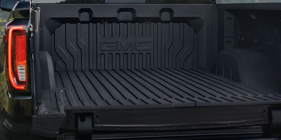 Back view of the CarbonPro Composite Bed of the 2024 GMC Sierra 1500.