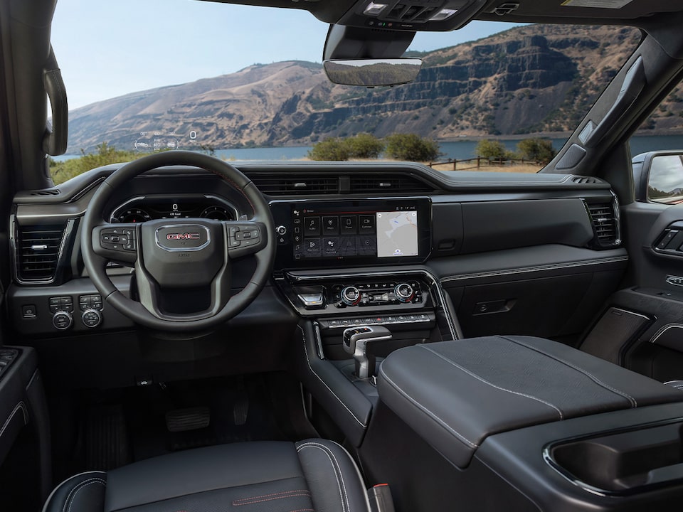 Zoomed-out view of the digital displays of the interiors of the 2024 GMC Sierra 1500.
