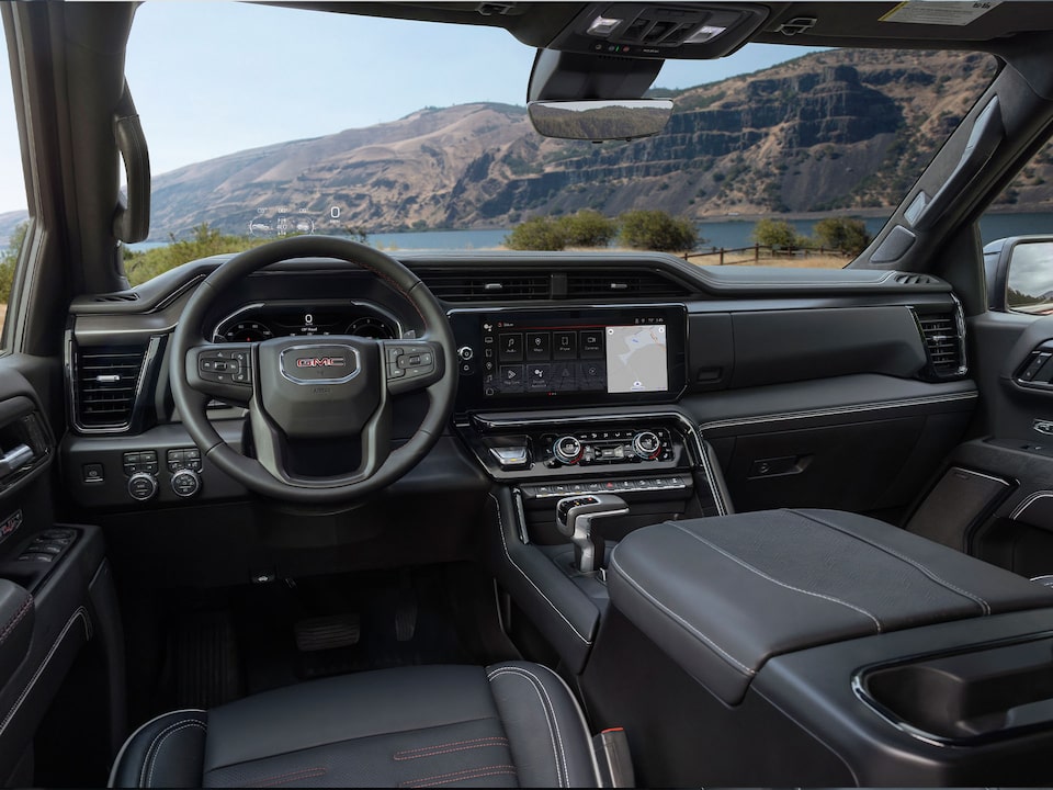 Zoomed-out view of the digital displays of the interiors of the 2024 GMC Sierra 1500.