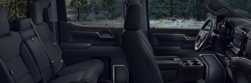 Jet Black interiors of the 2024 GMC Sierra 1500 SLE.