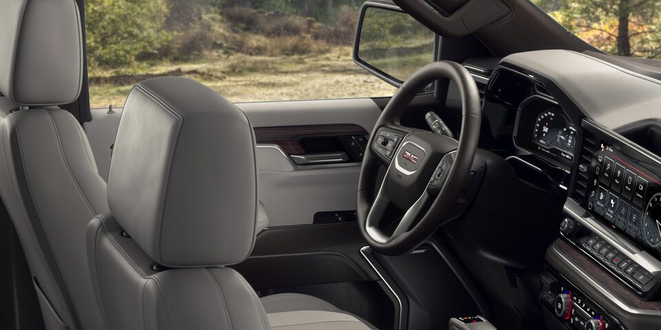 Heated steering wheel and seats of the 2024 GMC Sierra 1500 SLE.