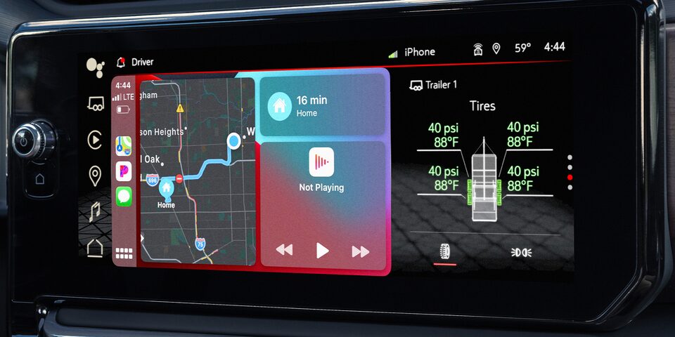 Using the infotainment screen through the wireless capability of the 2024 GMC Sierra 1500 SLE.