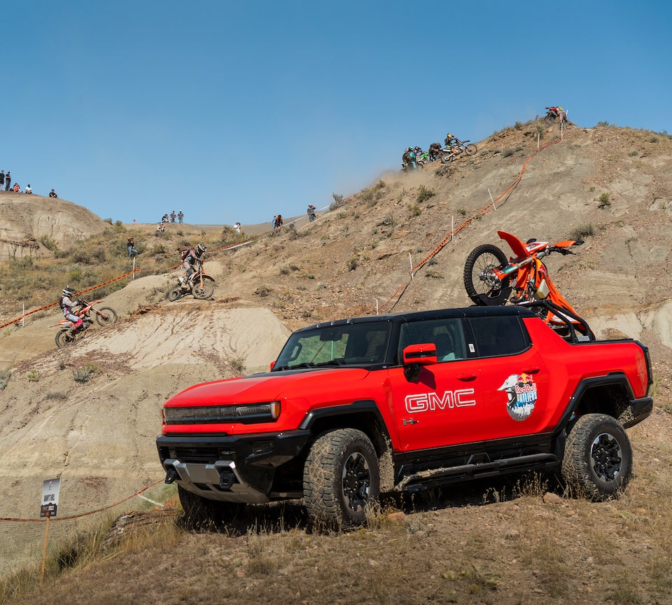 A biker performing a stunt in a Red Bull Joyride event.