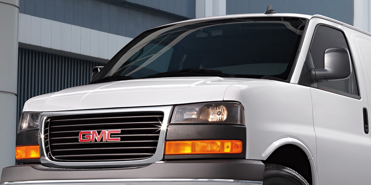 Close-Up View of the Front Grille and GMC logo of the 2026 GMC Savana Cargo Van.