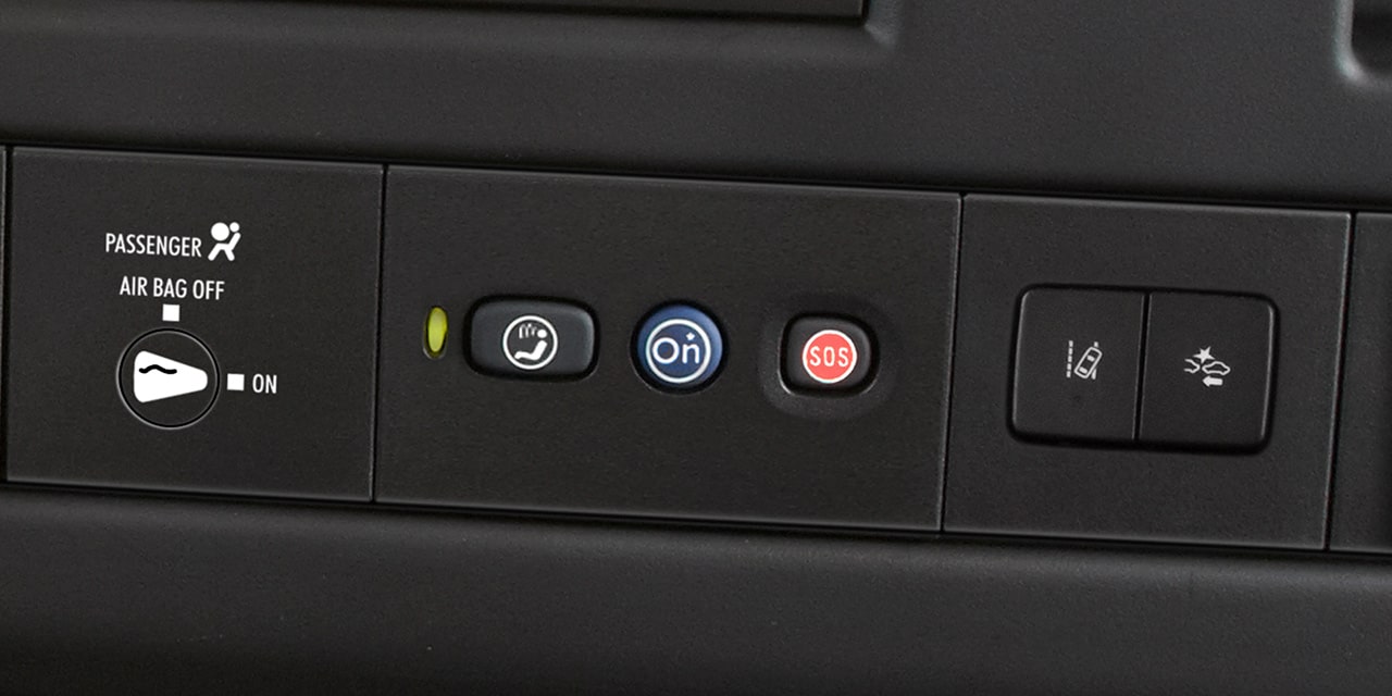 Close-Up View of OnStar and Emergency Services Buttons inside a 2026 GMC Cargo Passenger Van.