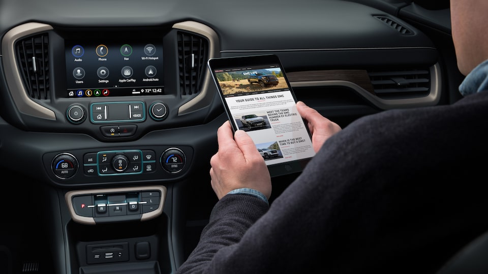 Person using the build-in Wi-Fi in the 2022 Terrain.