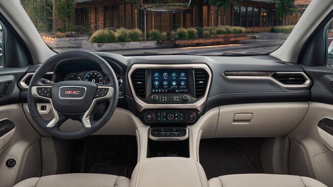 2023 GMC Acadia Denali dashboard and steering wheel.