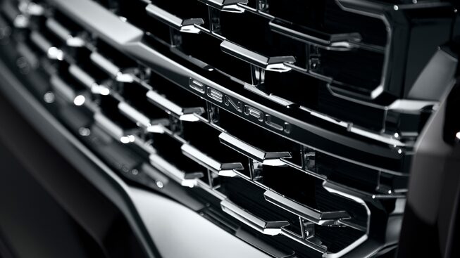 Close-up view of the 2023 GMC Acadia Denali Grille.