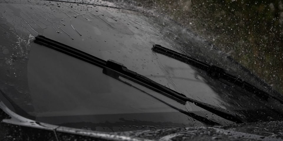 Windshield wipers on the 2024 GMC Yukon AT4 wiping down rain.