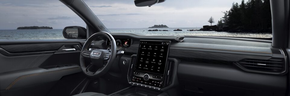 Front passenger's view of the interiors of the 2025 GMC Acadia AT4.
