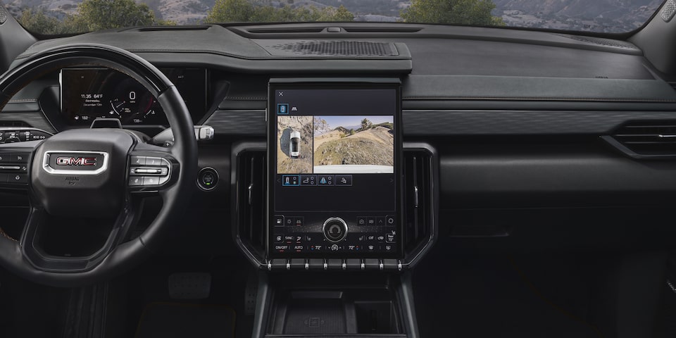 Front view of the infotainment screen of the 2025 GMC Acadia AT4.