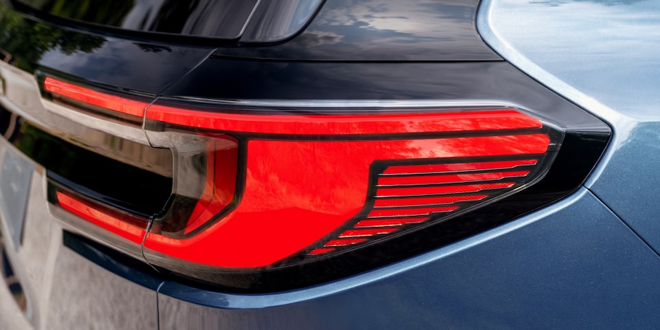 Close up view of the taillamp of the 2025 GMC Acadia Denali.