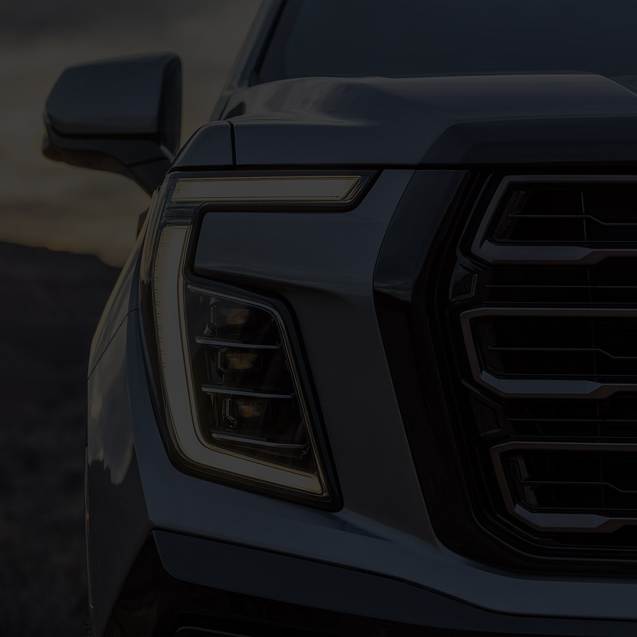 Close-up view of the 2025 GMC Yukon headlight.